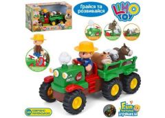 Трактор в кор. на бат. з причепом. музика-звук. вірші. пісні. світло. твари 33*2...