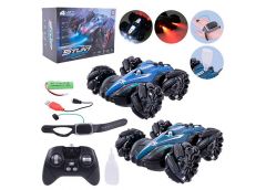 Машинка р/к. в кор. трюкова. акум. USB. управління рукою+пульт пар. світло 25*18...